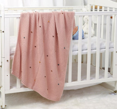 Ellis Knitted Baby Blanket. Rose Color. Size 90x70 cm on cot 2