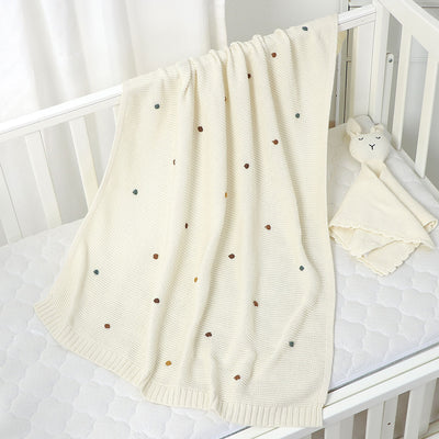 Kyrie Knitted Baby Blanket. Size 90x70 cm front